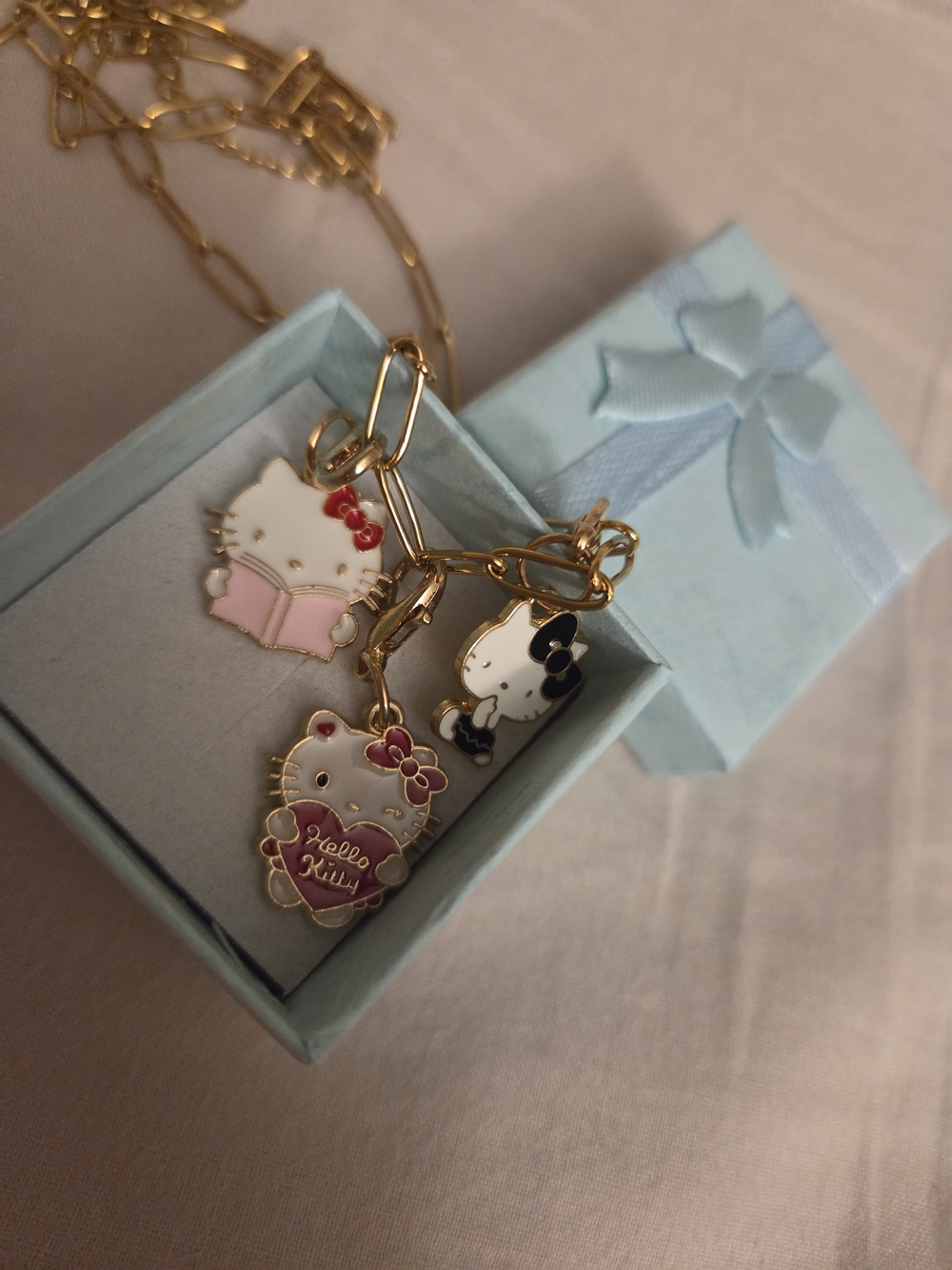 Hello Kitty Gold-Tone Paperclip Charm Necklace - 3 Charms, Box Included 16in